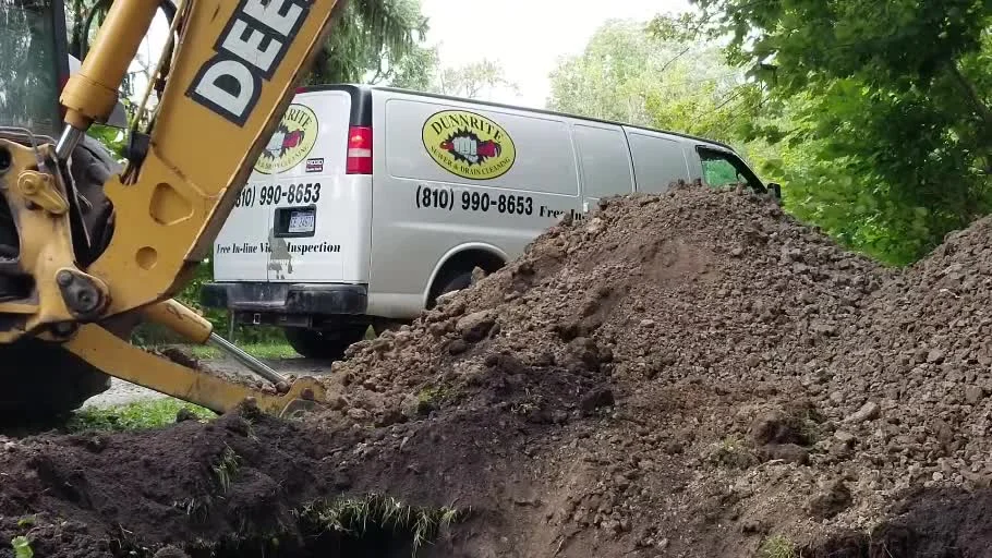 Dunnrite excavation equipment at an actual sewer repair job
